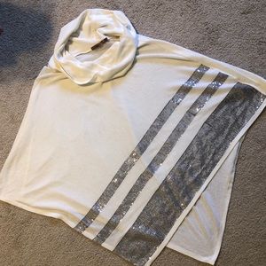 Cream shall with sequence embellishment